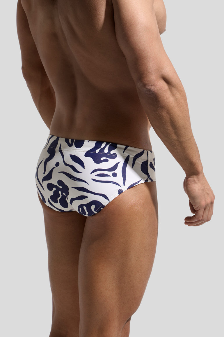 image of swimwear slip in Rivage print back view on male model by Bas Bains