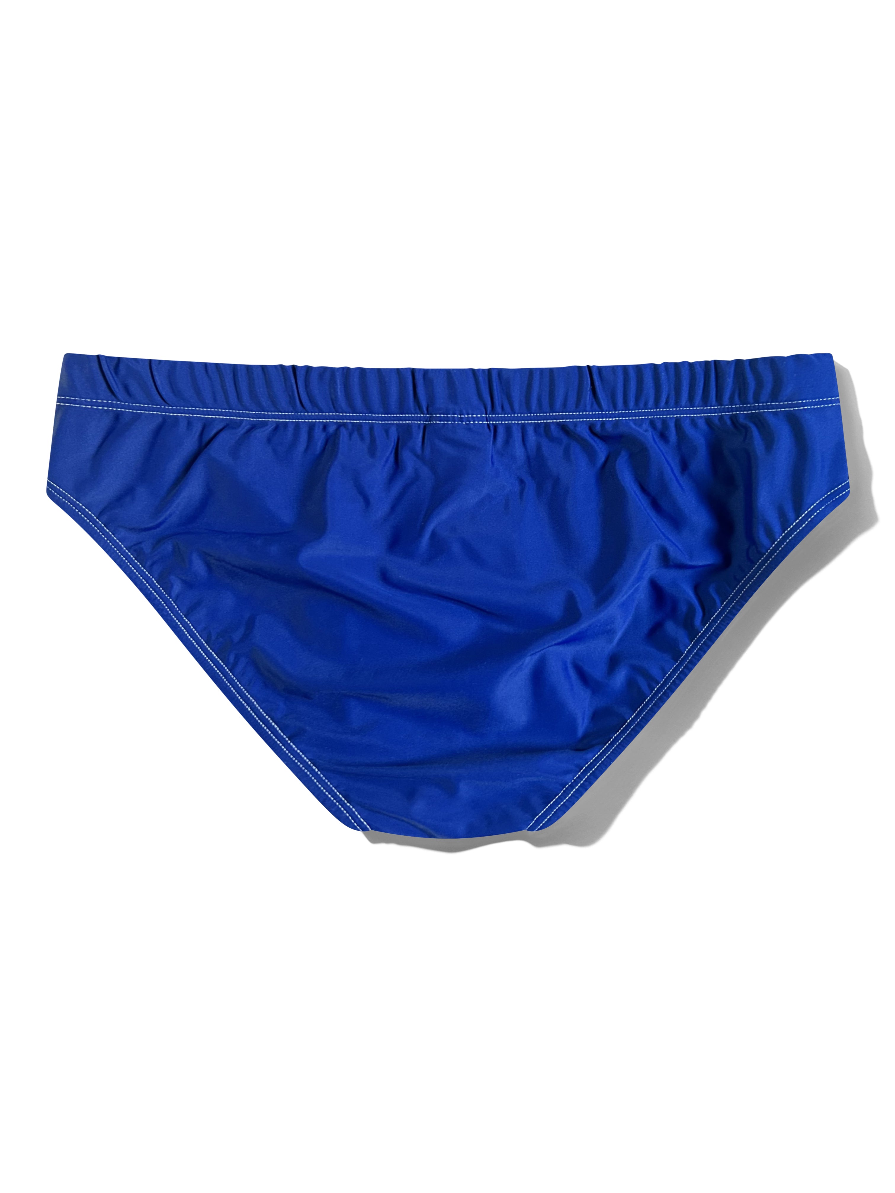 A pair of royal blue swim briefs with white contrast stitching, laid flat against a white background with a soft shadow.