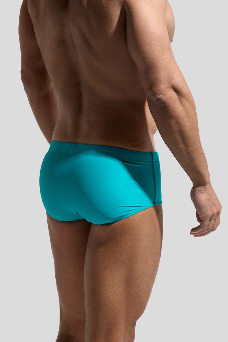 image of swimwear sunga in Menta green back view on male model by Bas Bains